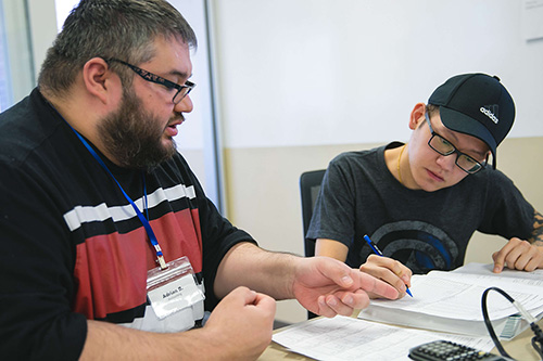 An instructor and a student work on mathematics together