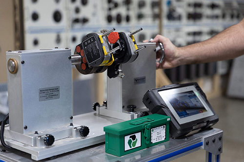 Closeup of a student working on a machine