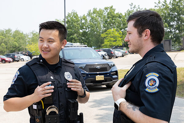 Law Enforcement students stand outside during training