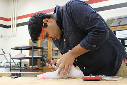 A student works on a prototype