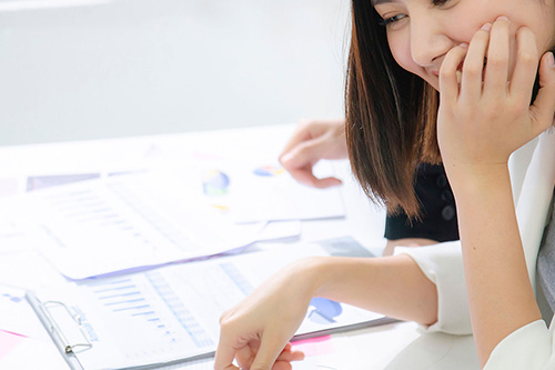 A student inspects quality reports