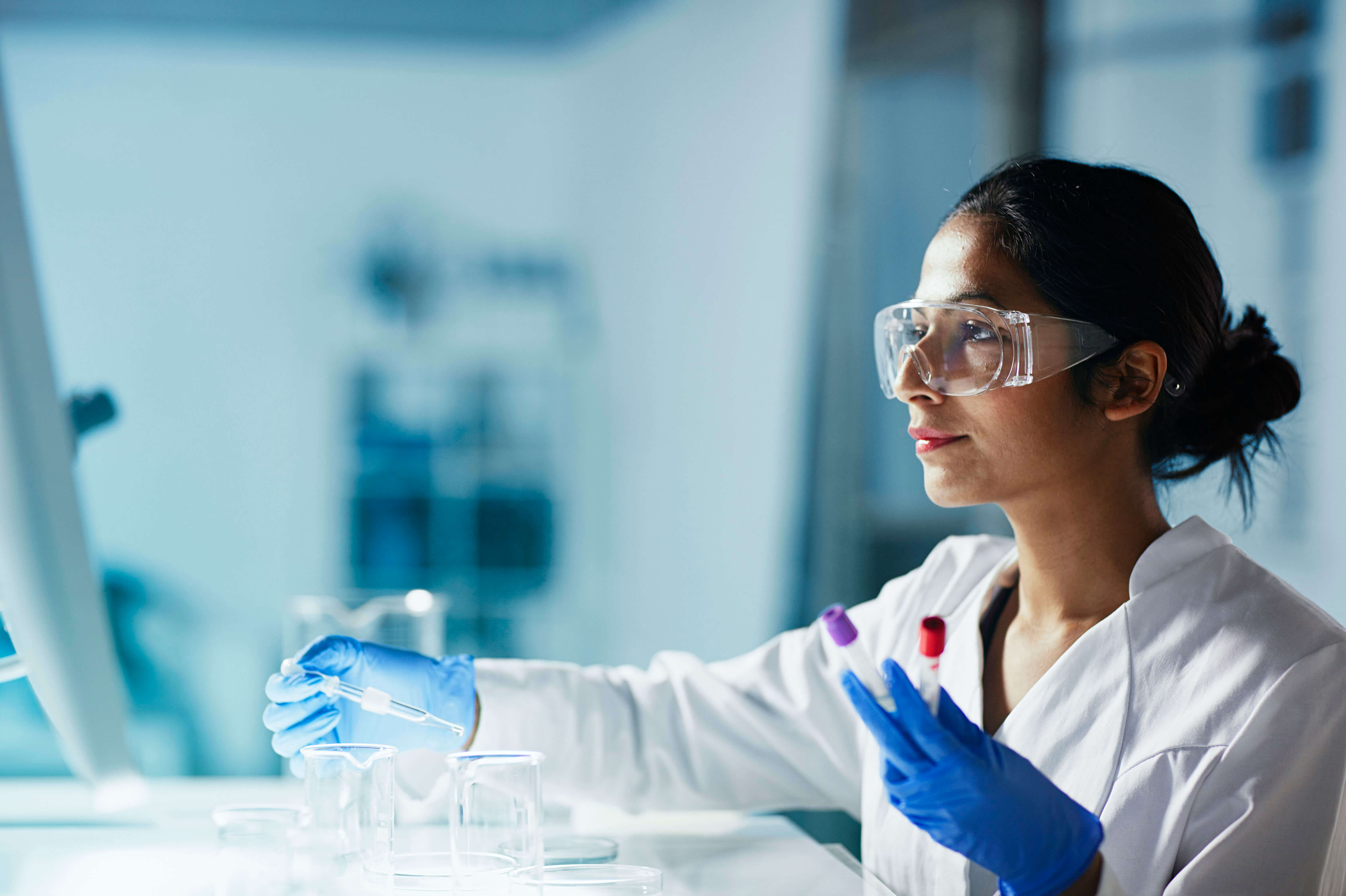 A woman works in a laboratory on tissue samples