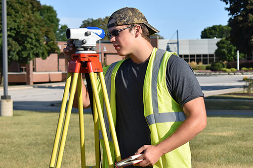 A student surveys the NWTC property