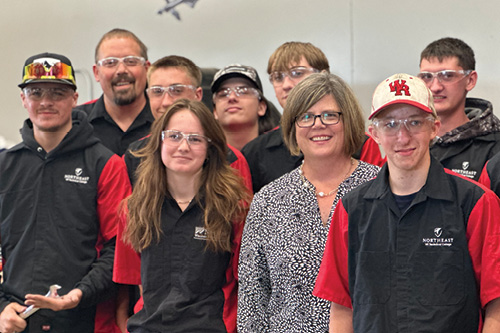 Dr. Kristen Raney with trades students