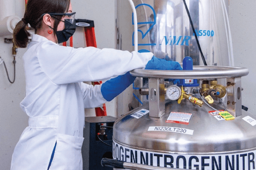 NWTC alumna Savanah Shumaker works near a nitrogen tank