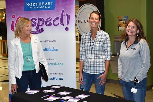 NWTC staff greet visitors at iRespect promotional table