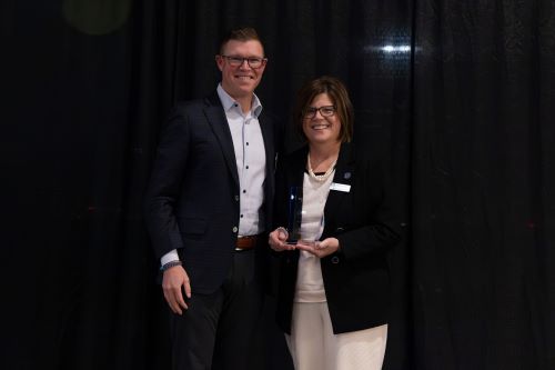 Adam Winters from GBP and NWTC President Kristen Raney 