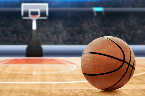 Basketball on gym floor
