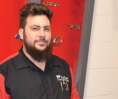 Automotive student honored for serving his community