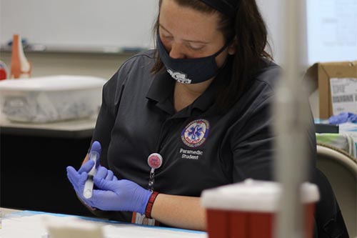 Emergency Medical Services student in class