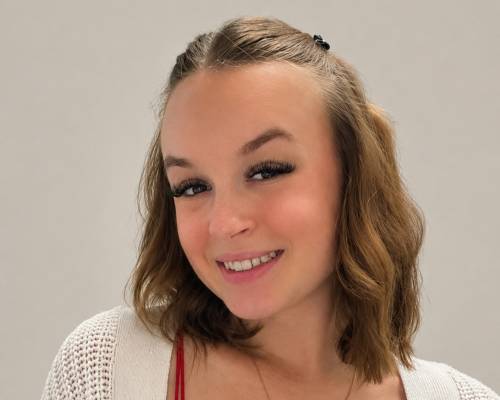 Karlie DeGrave faces camera directly, smiling
