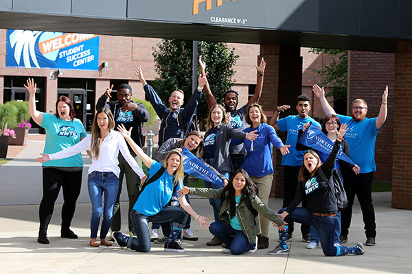 Recruitment team in front of library entrance