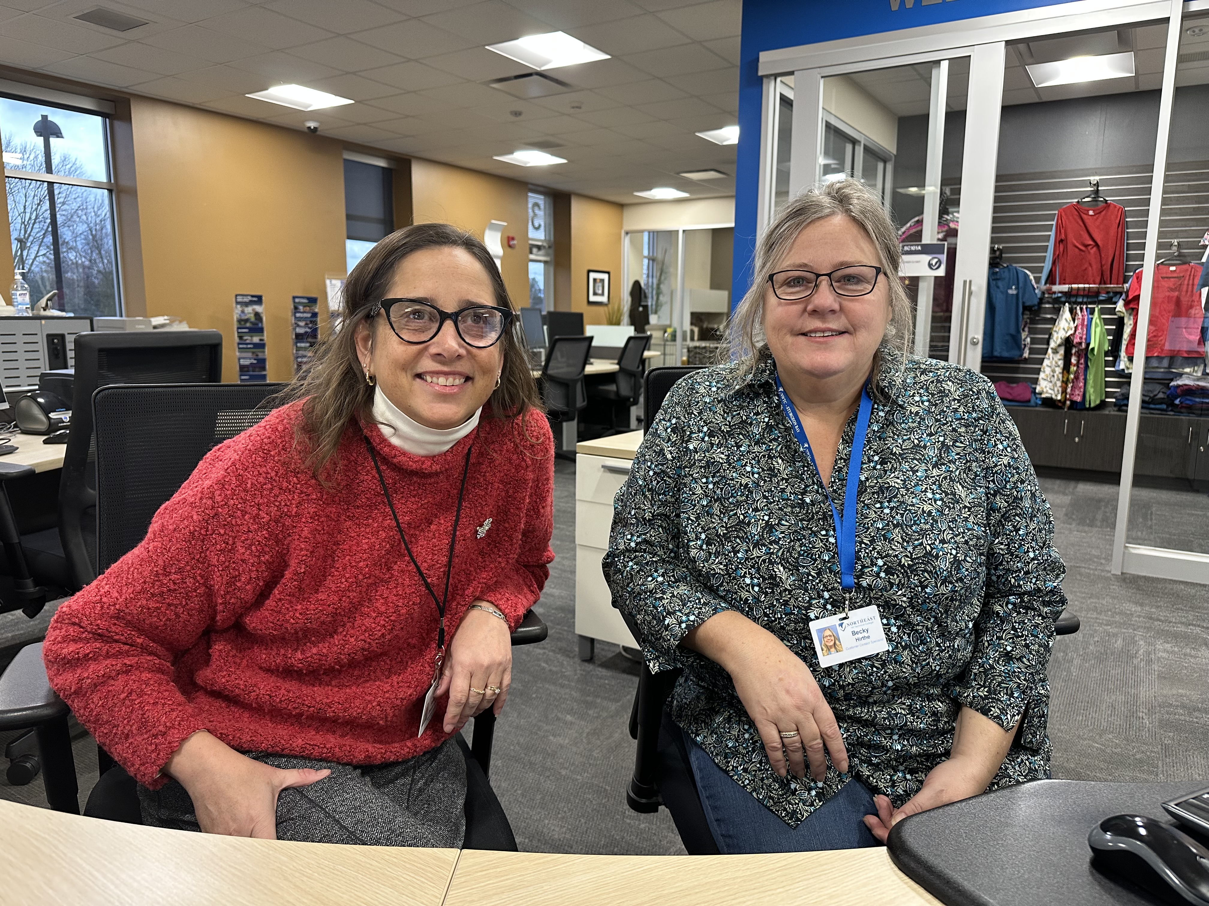 An academic advisor works with a student in the welcome center