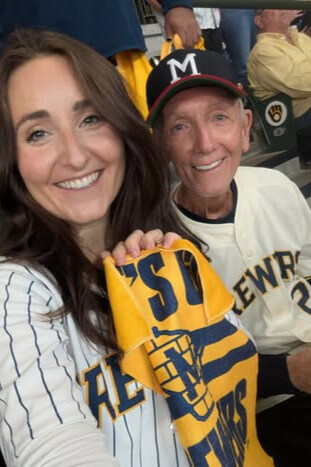 Jerry Lintz with his daughter at a Milwaukee Brewers game