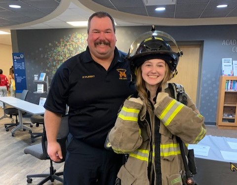 Student with fire gear on