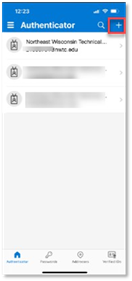 Phone authenticator app screen with  "+" button highlighted