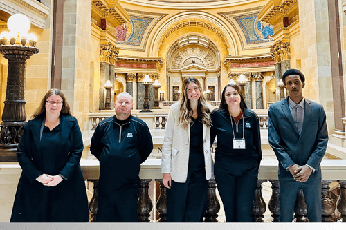 Students standing in Madison Capitol