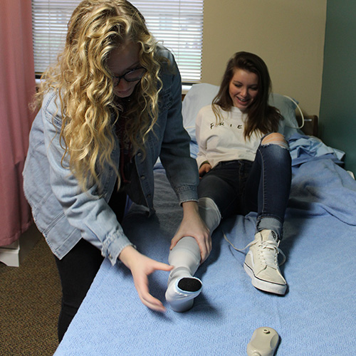 Ashwaubenon student with a patient