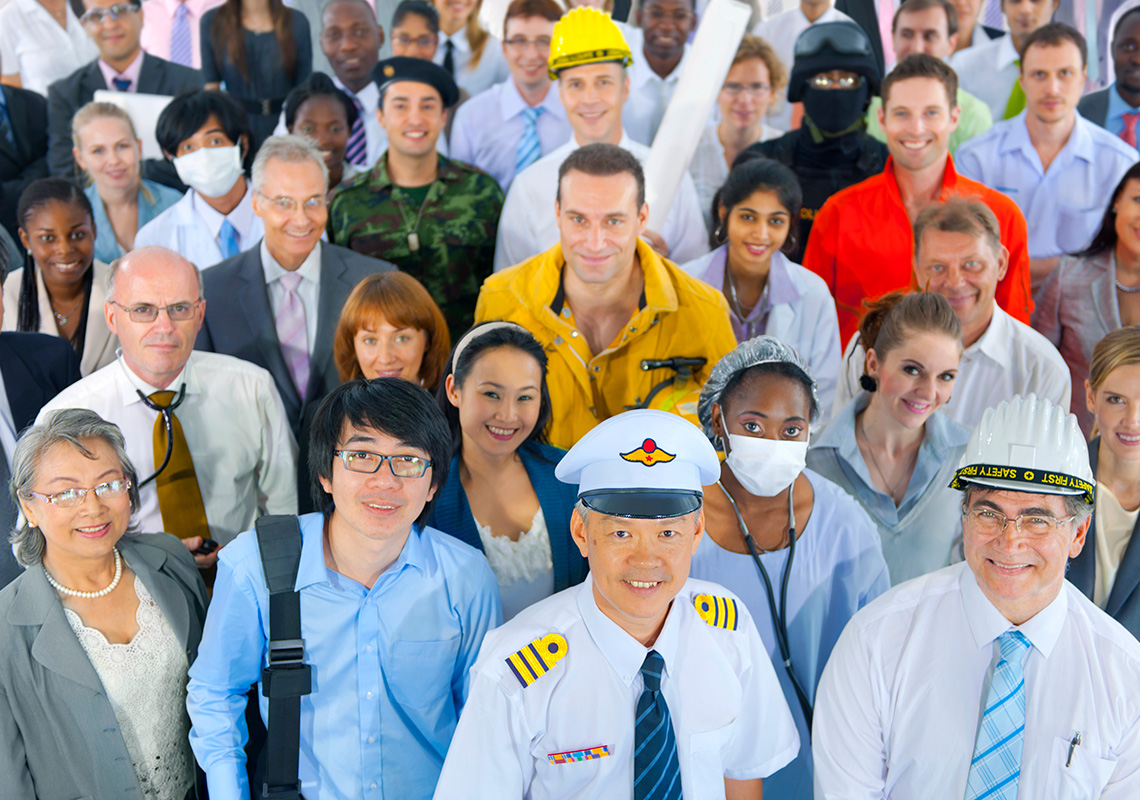A group of diverse employees stand together