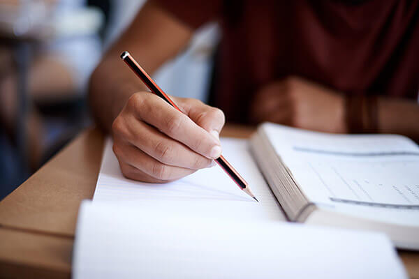 Student studies for an exam