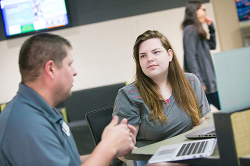 NWTC Academic Advisor speaking to a student.