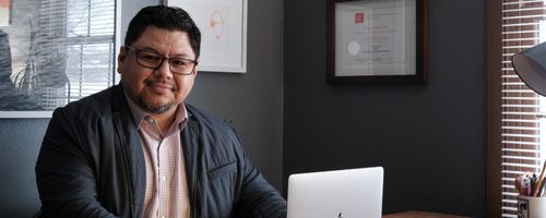 image of frank juarez at a laptop