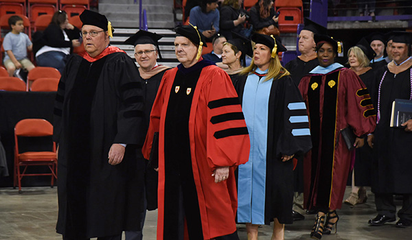 College leadership in their regalia duirng graduation
