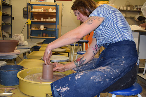 woman at potters wheel