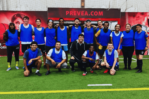 Students pose for soccer group photo