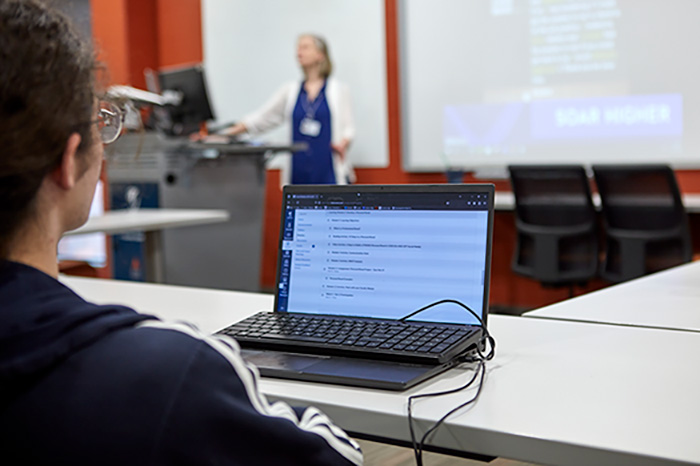 A student uses a tablet in class