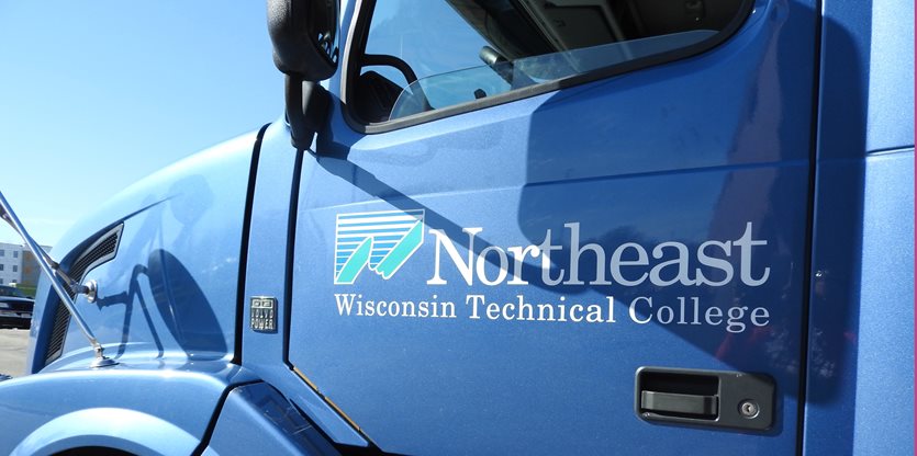Truck photo with NWTC logo on door