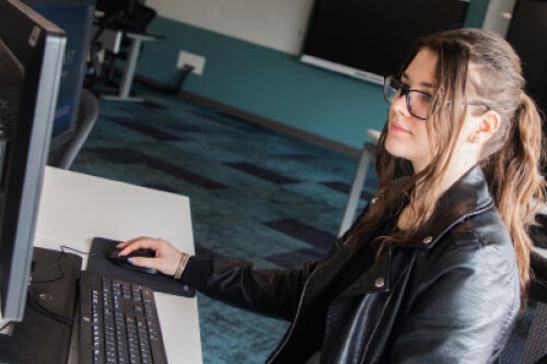 Student works on computer