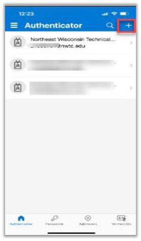 The authenticator app open with the Plus sign to add a service otlined in red.