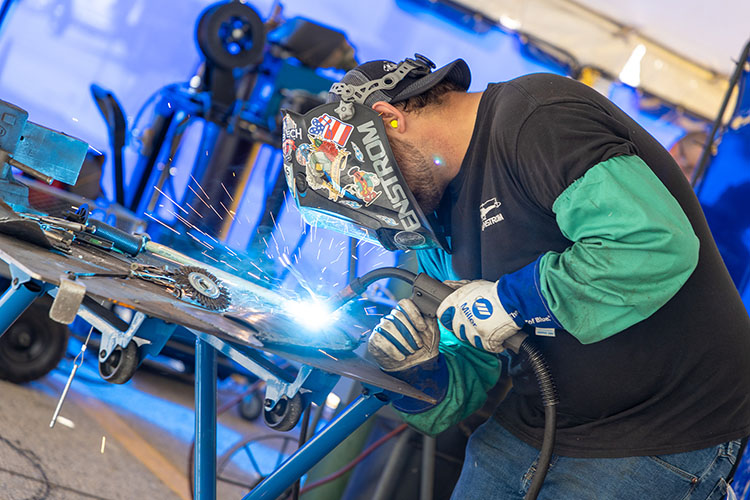 Welder creating a sculpture