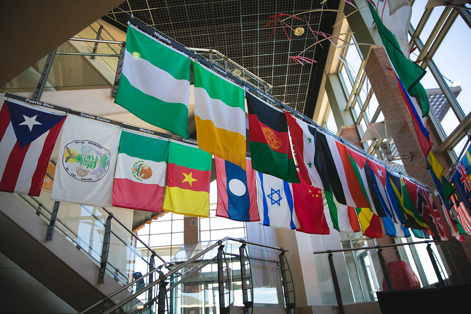 International flags on display in the Green Bay Campus lobby
